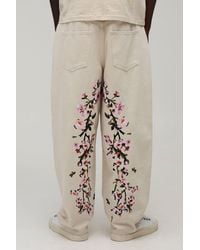 BoohooMAN - Floral Embroidered Balloon Fit Jeans - Lyst