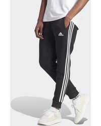 adidas - Essentials Fleece 3-Stripes Tapered Cuff Pants - Lyst
