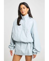 Boohoo - Tie Side Funnel Neck Lightweight Jacket - Lyst