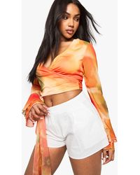 Boohoo - Abstract Chiffon Tie Front Flare Sleeve Blouse - Lyst