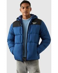 Reebok - Reversible Puffer - Lyst