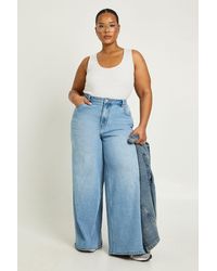 Boohoo - The Plus Mid Waist Wide Leg Jean - Lyst