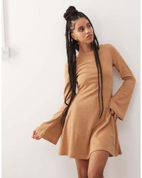Reclaimed Vintage - Textured Jersey Flare Sleeve Boho Mini Dress - Lyst
