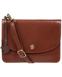 Conkca - 'Cara' Conker Leather Cross Body Clutch Bag - Lyst