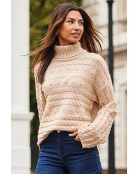 Sosandar - Natural Roll Neck Cable Knit Pom Pom Jumper - Lyst