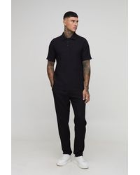 BoohooMAN - Tall Pleated Regular Fit Polo & Tapered Trouser Set - Lyst