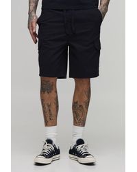 BoohooMAN - Tall Slim Fit Elasticated Mid Length Twill Cargo Shorts - Lyst