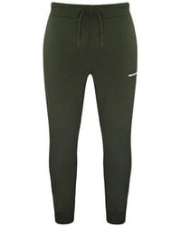 New Balance - Stretch Graphic Logo Green Classic Core Track Pants Mp03901 Arg - Lyst