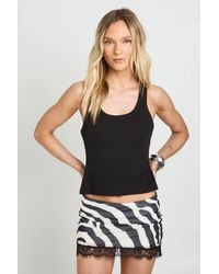 Boohoo - Petite Zebra Print Mesh Low Rise Lace Trim Mini Skirt - Lyst