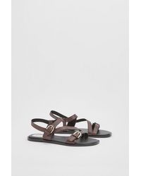 Wallis - Sheska Faux Leather Buckle Detail Asymmetrical Flat Sandals - Lyst