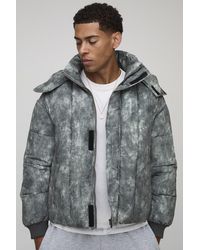 BoohooMAN - Oversized Fit Washed Nylon Hooded Funnel Neck Duvet Puffer Jacket - Lyst