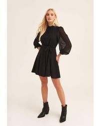 Gini London - Zwarte Skater Mini-jurk Met Lange Mouwen - Lyst