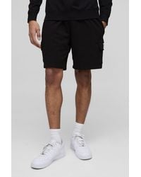 BoohooMAN - Lightweight Basic Relaxed Mid Length Label Cargo Shorts - Lyst