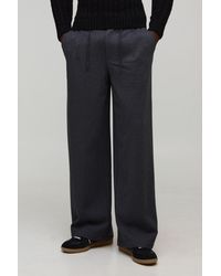 BoohooMAN - Relaxed Fit Half & Waistband Textured Trouser - Lyst