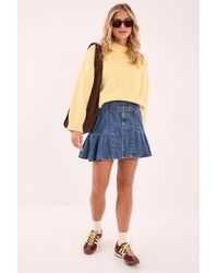 Nasty Gal - Buckle Pleated Denim Mini Skirt - Lyst