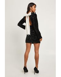 Boohoo - Petite Velvet Sequin Bow Back Mini Dress - Lyst