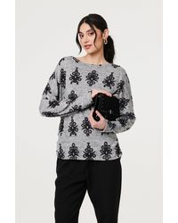 Izabel London - Printed Long Batwing Sleeve Relaxed Top - Lyst