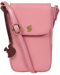 Conkca - 'Buzz' Blush Leather Cross Body Phone Bag - Lyst