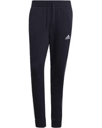 adidas - Essentials Fleece Tapered Cuff 3-Stripes Pants - Lyst