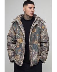 BoohooMAN - Tall Oversized Forest Camo Hooded Funnel Neck Puffer Jacket - Lyst