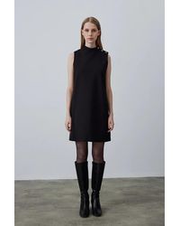 GUSTO - High Collar Sleeveless Dress With Buttons - Lyst