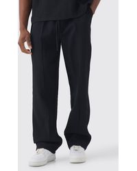 BoohooMAN - Elasticated Waist Relaxed Fit Pleated Trouser - Lyst