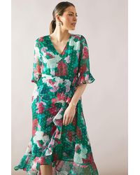 Wallis - Floral Glitter Spot Ruffle Midi Dress - Lyst