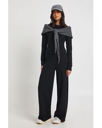 Boohoo - Petite Rib Button Through Long Sleeve Top And Wide Leg Trouser Co-Ord - Lyst