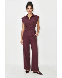 Bianco Lucci - Belted Sleeveless Blouse And Wide-Leg Trousers Set - Lyst
