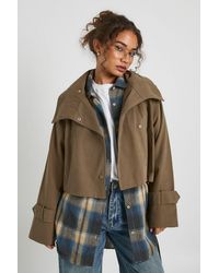 Boohoo - Asymmetric Belted Cropped Trench Jacket - Lyst