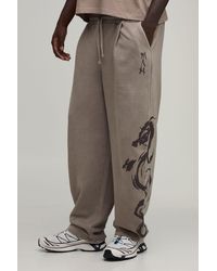BoohooMAN - Balloon Fit Dragon Printed Washed Joggers - Lyst