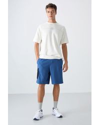 TOMMY LIFE - Wide-Leg Cargo Shorts - Lyst