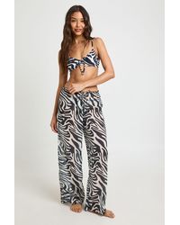 Boohoo - Zebra Print Chiffon Wide Leg Beach Trouser - Lyst