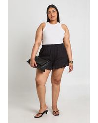 Boohoo - Plus Broiderie Elasticated Waist Flippy Short - Lyst