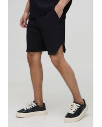 BoohooMAN - Relaxed Fit Runner Hem Pleated Short - Lyst