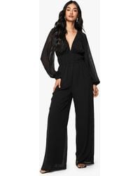 Boohoo - Chiffon V Neck Ruched Wide Leg Jumpsuit - Lyst