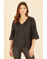Yumi' - Black Sequin Top With Fluted Sleeve - Lyst