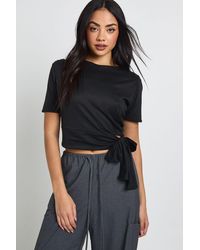 Boohoo - Supersoft Cut Out Tie Drape Short Sleeve Top - Lyst