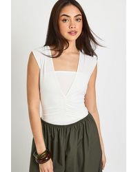 Boohoo - Slinky Ruched V Neck Bodysuit - Lyst