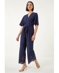 Roman - Laser Cut Hem Wrap Front Jumpsuit - Lyst