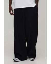 BoohooMAN - Extreme Wide Leg Pleated Jogger - Lyst