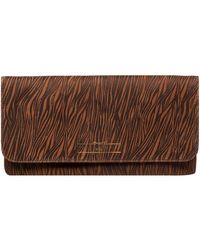 Pure Luxuries - 'Golders' Print Leather Clutch Bag - Lyst