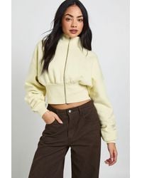 Boohoo - Funnel Neck Cinched Waist Zip Through - Lyst