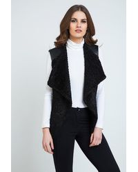 Conquista - Astrakan Wintervest Met Plooidetail - Lyst
