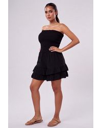 Femme Luxe - Shirred Bandeau Frill Hem Playsuit - Lyst