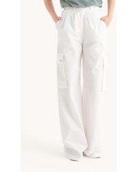 Hiccup - High Waist Pleated Cargo Trousers With A Pocket Detail - Lyst