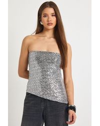 Boohoo - Sequin Bandeau Asym Hem Top - Lyst