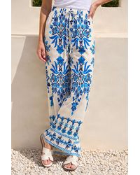Roman - Border Print Trousers - Lyst