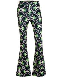 Colourful Rebel - High Waist Flared Broek Graphic Peached Extra Flare Pants Met Grafische Print Groen - Lyst