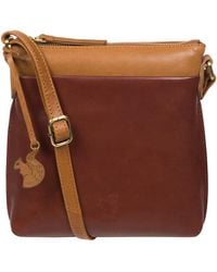Conkca - 'Nikita' Conker & Dark Tan Leather Cross Body Bag - Lyst